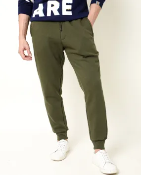 Rare Rabbit Men's Titan Light Green Cotton Polyester Fabric Relaxed Fit Mid Rise Knitted Track Pant