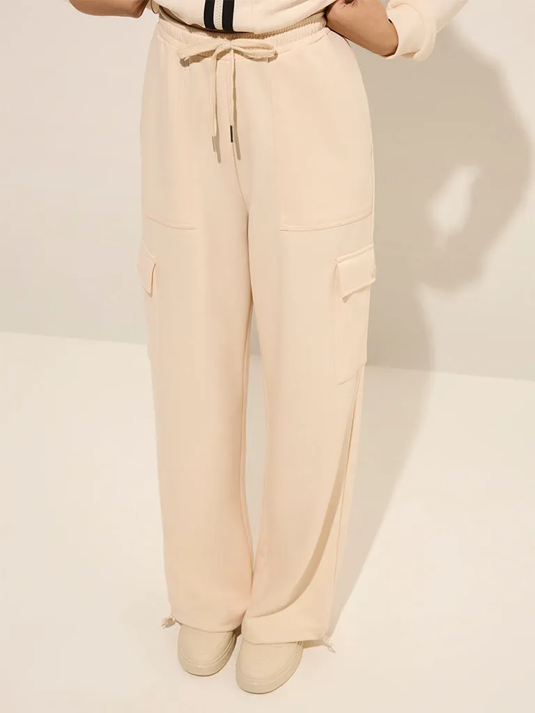 Studiofit Beige Solid High-Rise Cargo Track Pants